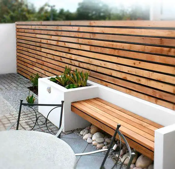 Faça um banco confortável e sofisticado unindo concreto e madeira