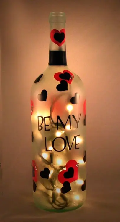 Luminária com garrafa de vidro