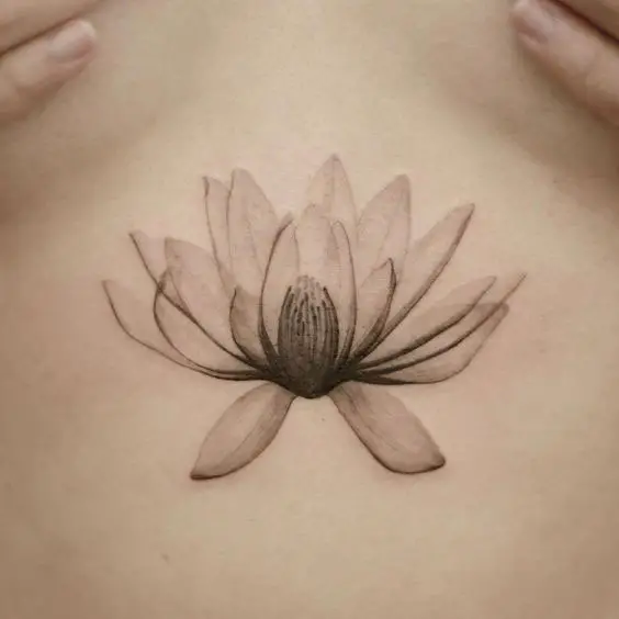 Tatuagem flor de lótus preta sombreada