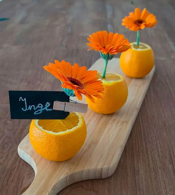 Decore a mesa no Dia das Mães com laranjas e flores